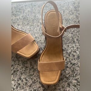 Never worn tan suede heel!